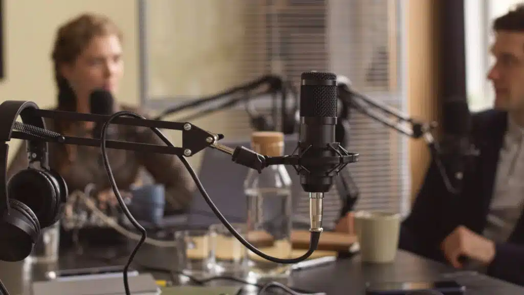 How to Convert Podcast Listeners Into Paying Clients (The Part Nobody Talks About) people chatting in podcast studio 2025 12 17 22 12 09 utc.00 00 00 00.still001